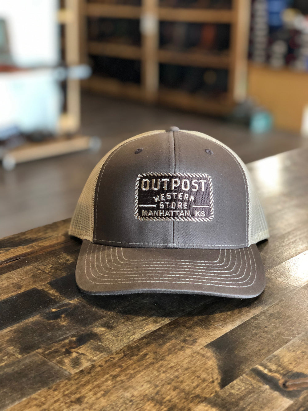 Grey fabric front, black and white Outpost logo, white mesh back, 112 Richardson cap