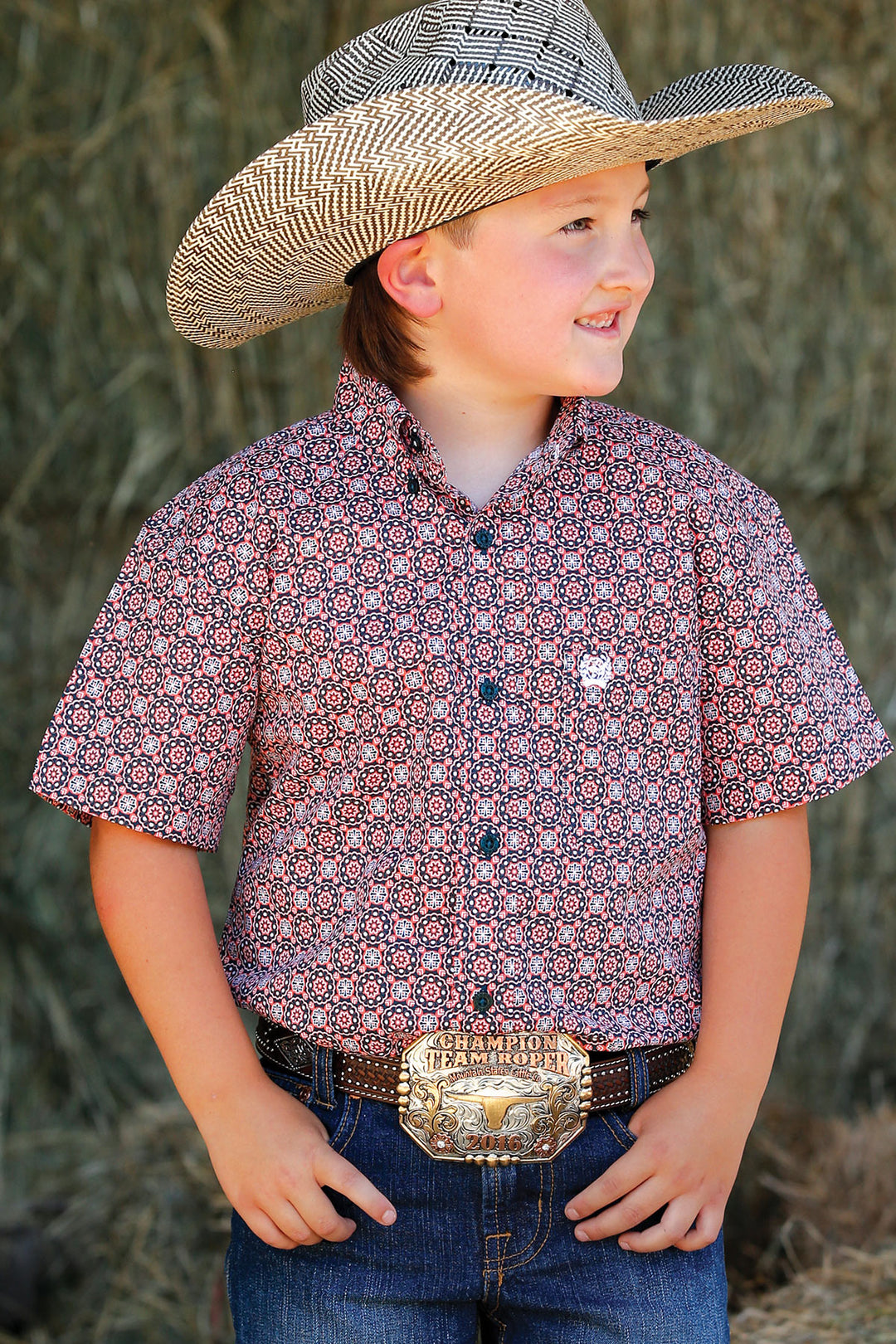 Young cowboy wearing Cinch | Boys Multi Print SS Shirt