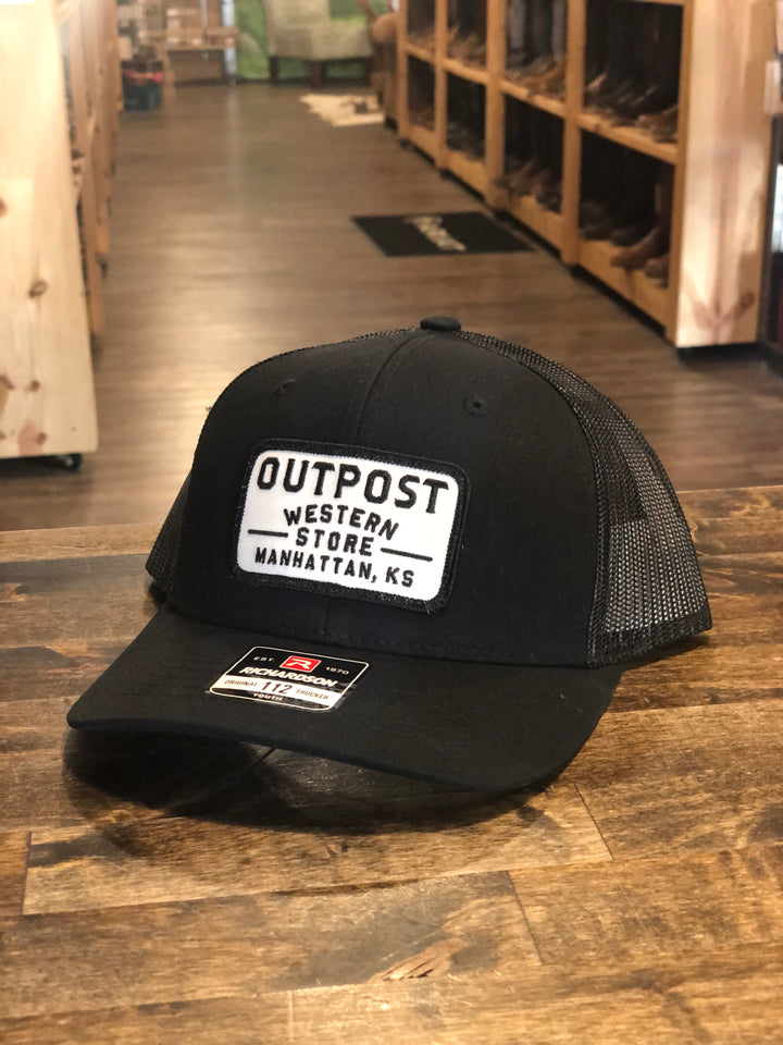 Black fabric front, black mesh, black/white Outpost logo patch youth cap
