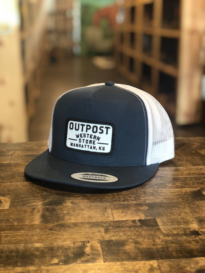 Outpost Yupoong Trucker Cap Navy fabric front with white mesh